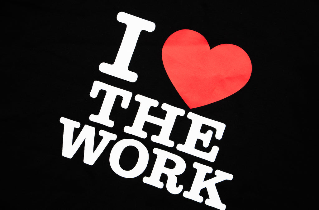 black “I ❤️ THE WORK” compression tank