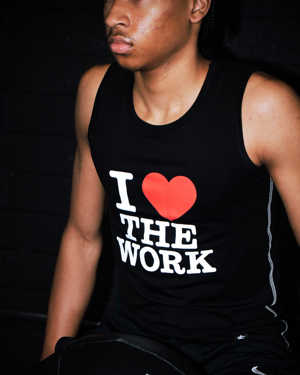 black “I ❤️ THE WORK” compression tank