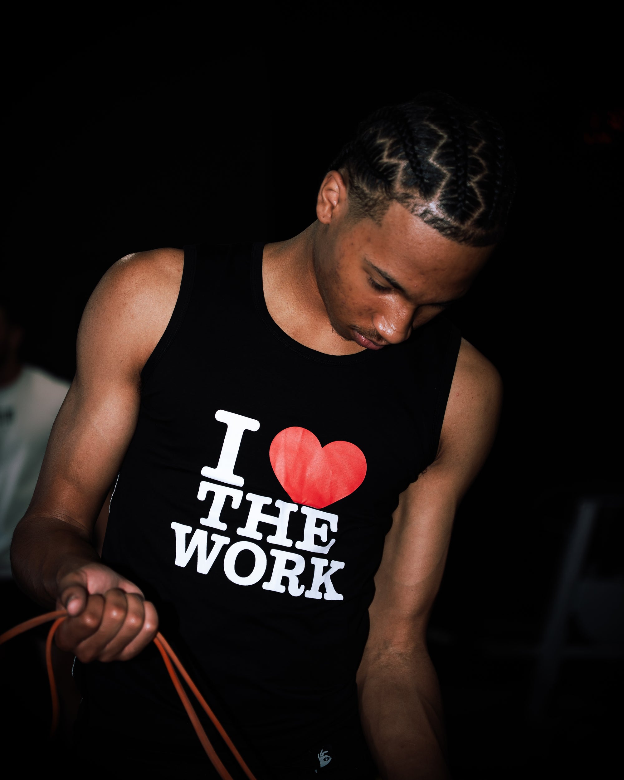 black “I ❤️ THE WORK” compression tank