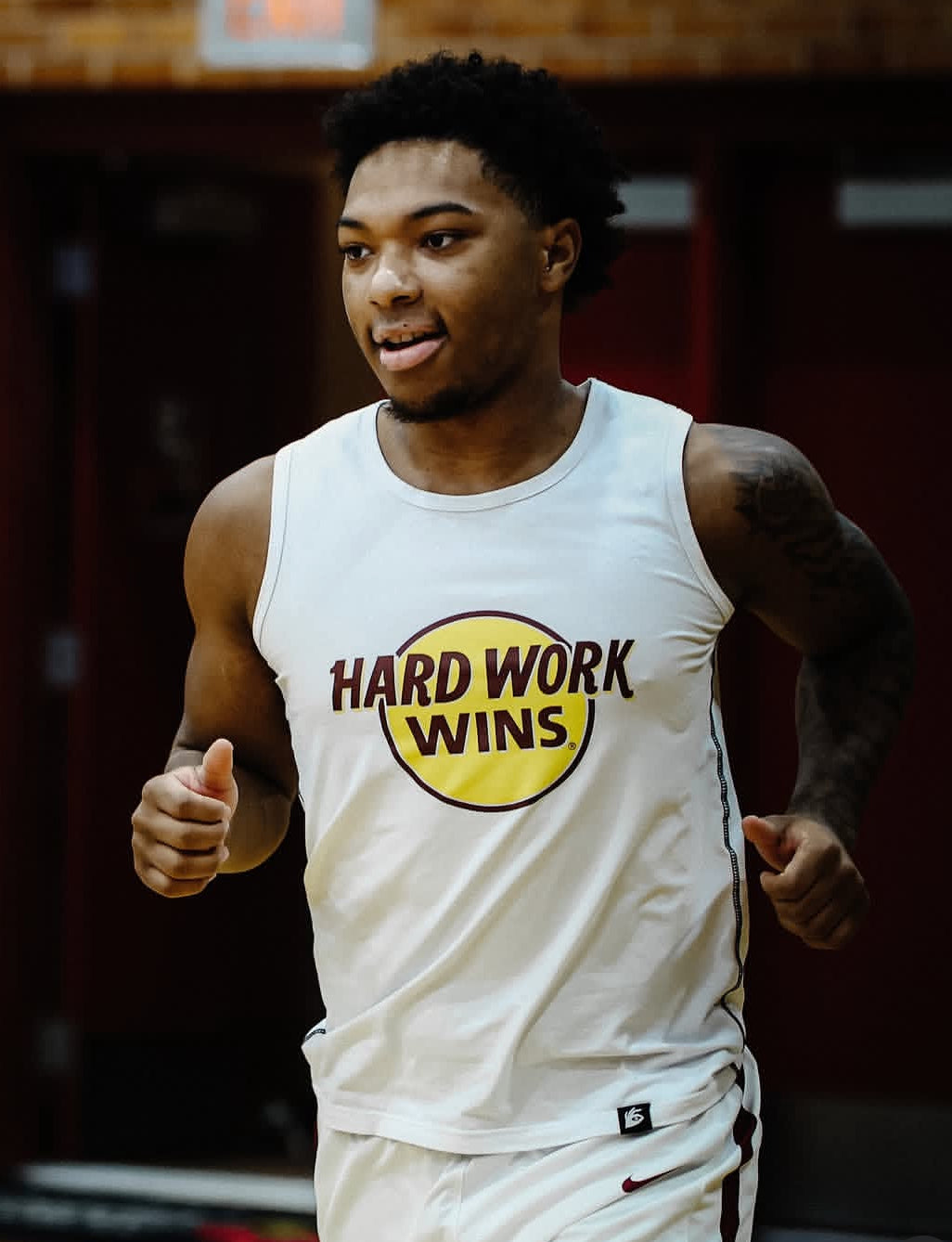 white HARD WORK WINS compression tank