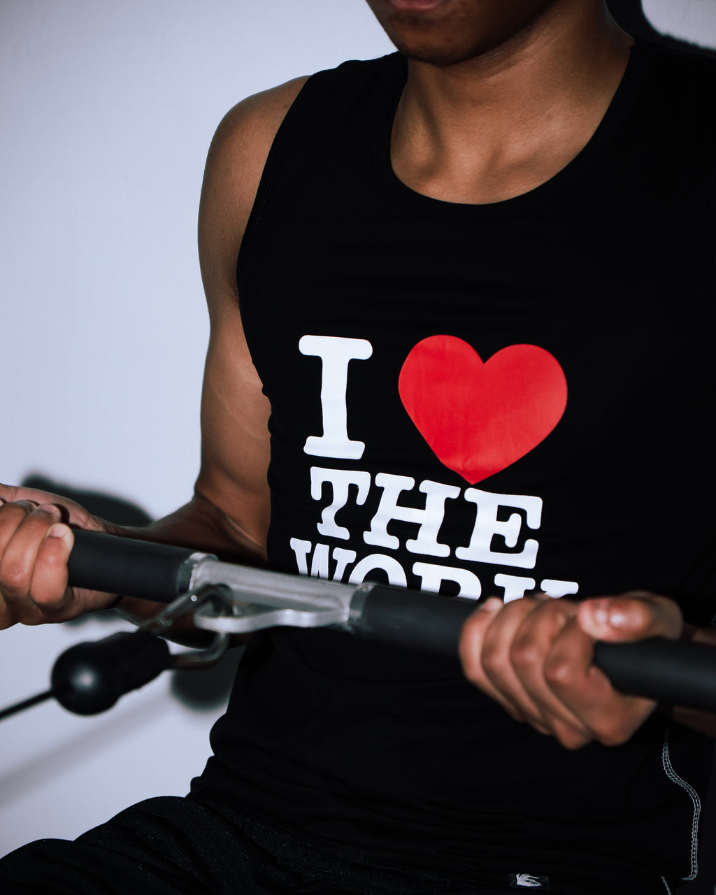 black “I ❤️ THE WORK” compression tank
