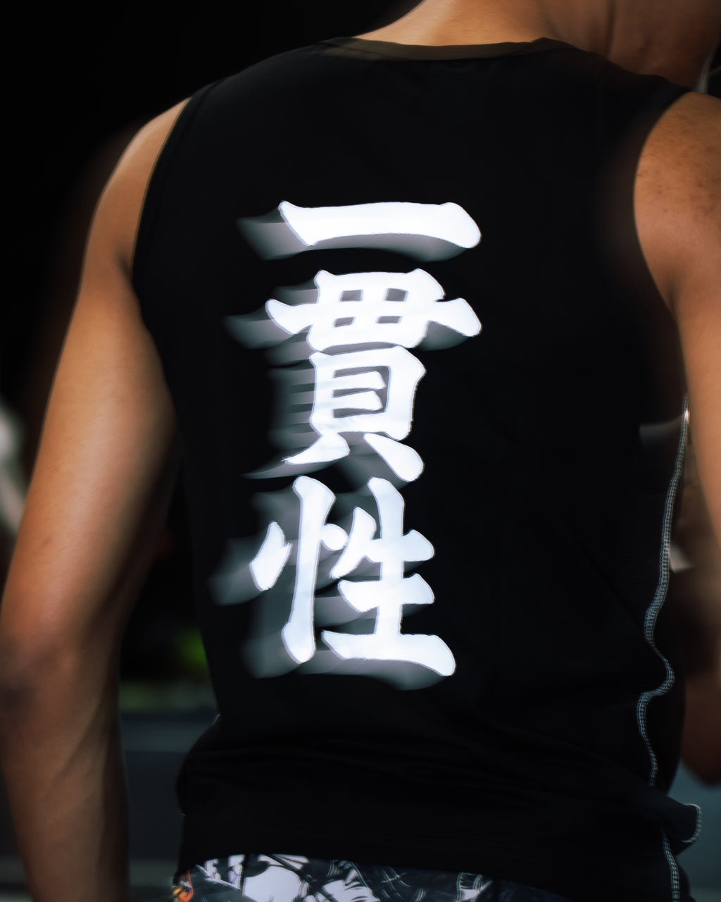 black “I ❤️ THE WORK” compression tank